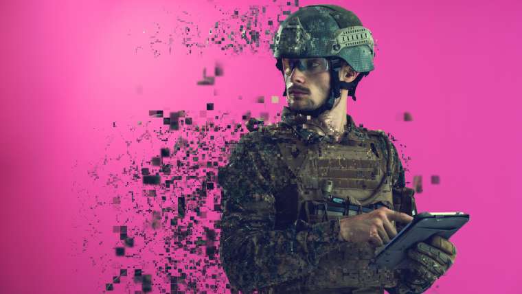 soldier using tablet computer closeup pixelated